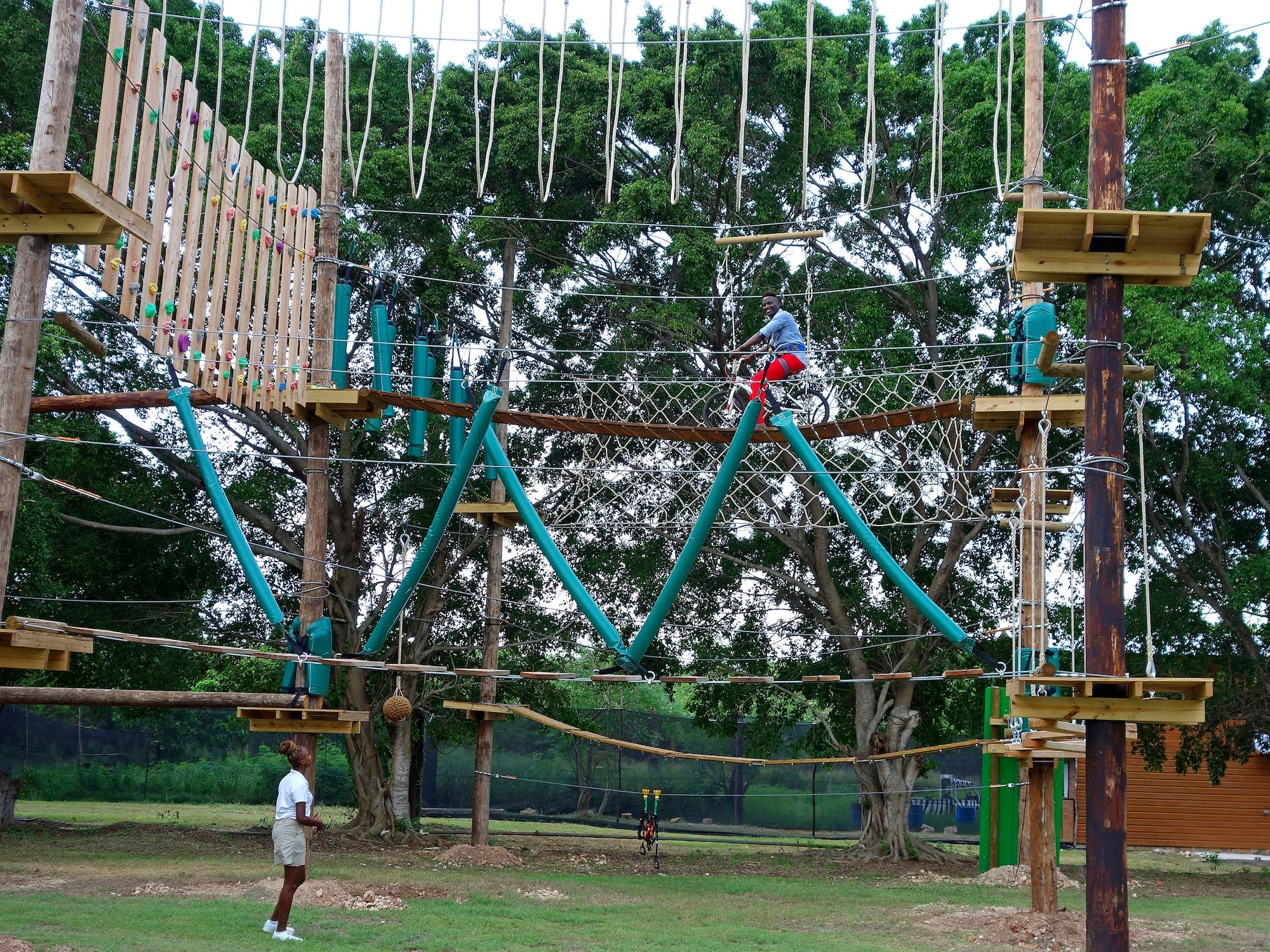 a person on a rope bridge