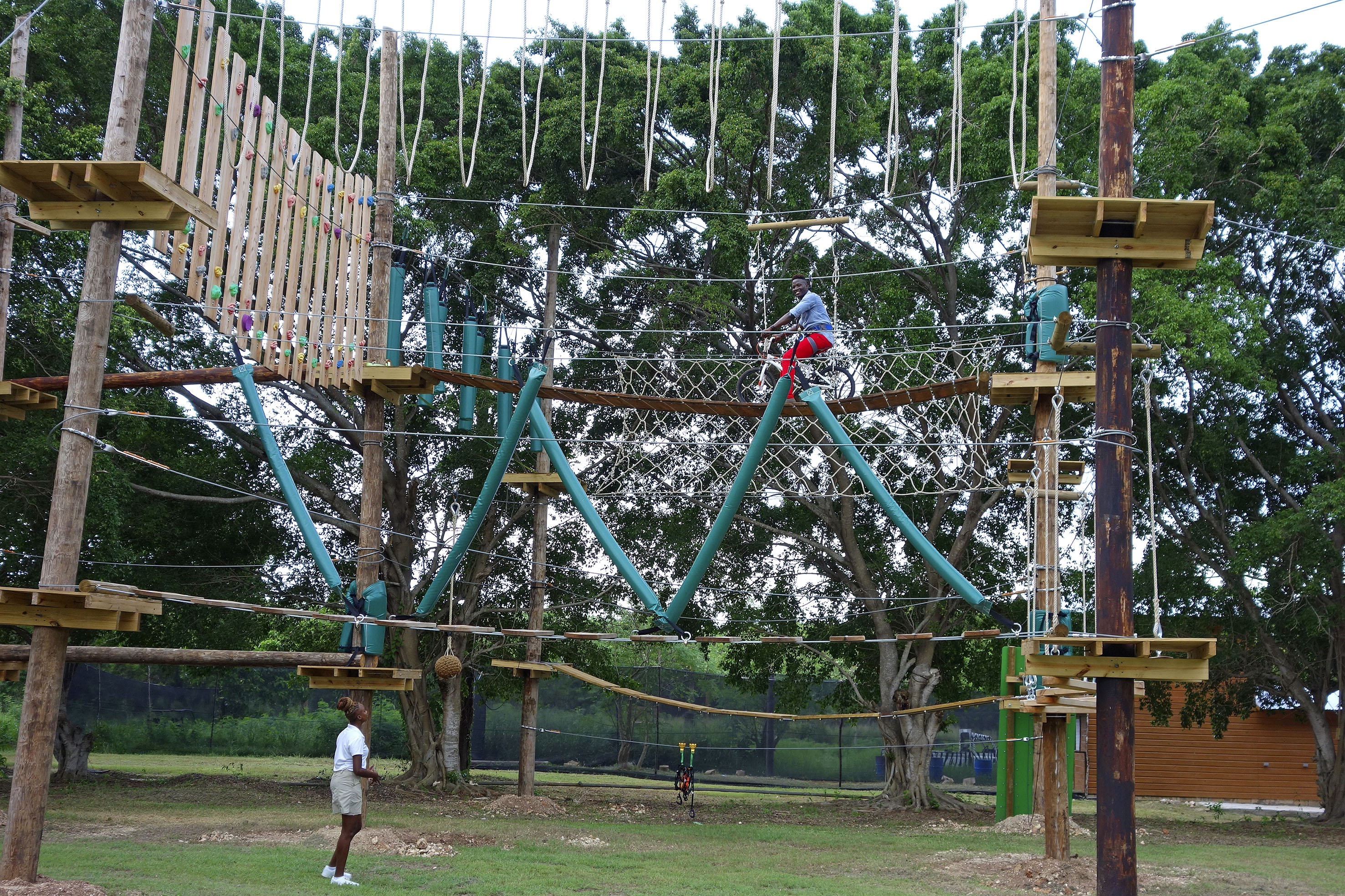 a person on a rope bridge
