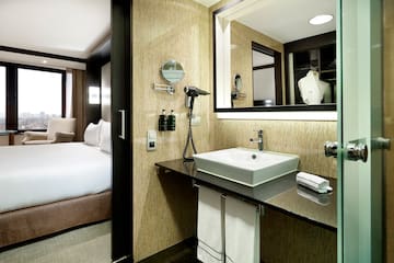 a bathroom with a mirror and a sink