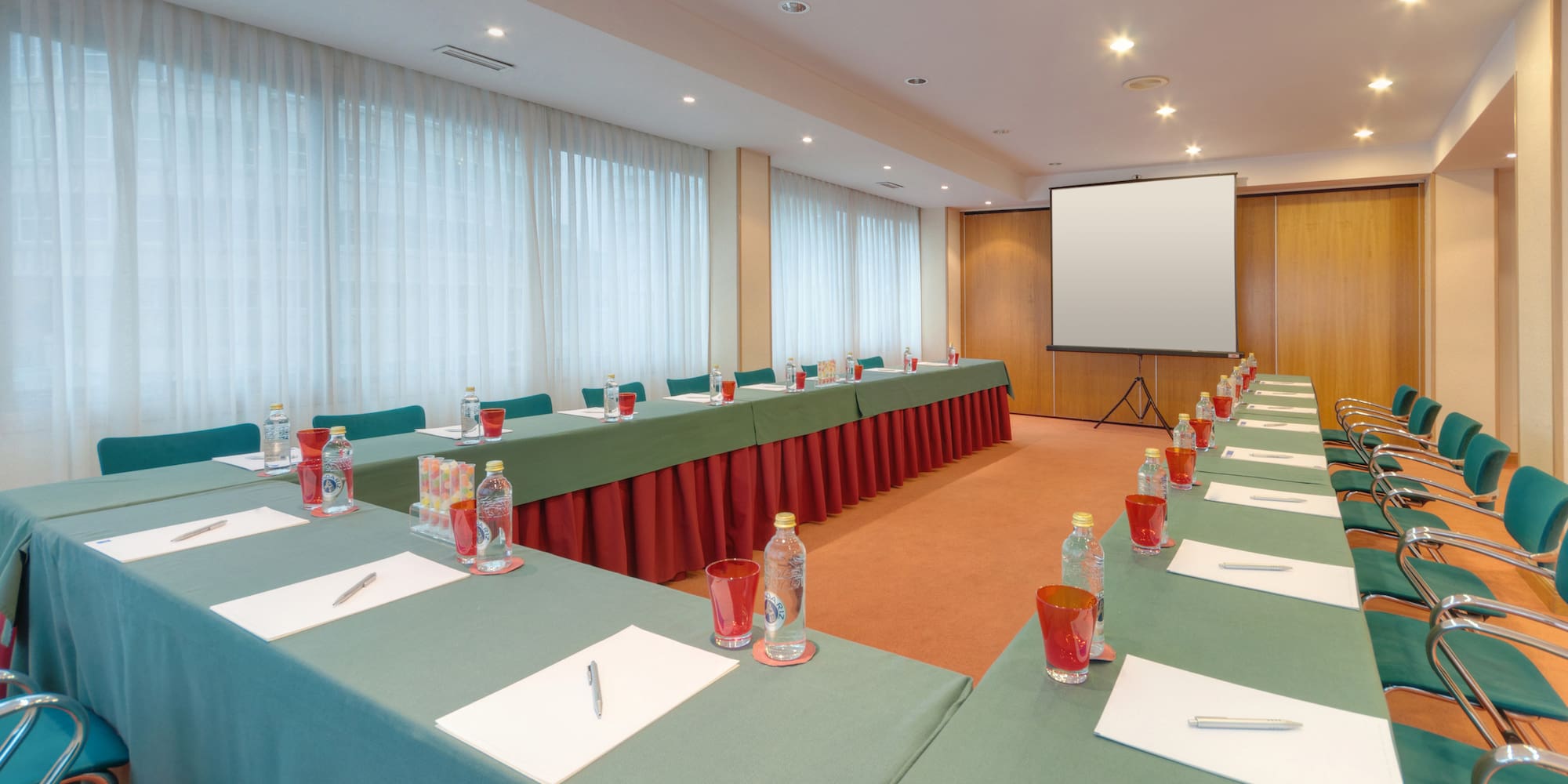 a room with tables and chairs