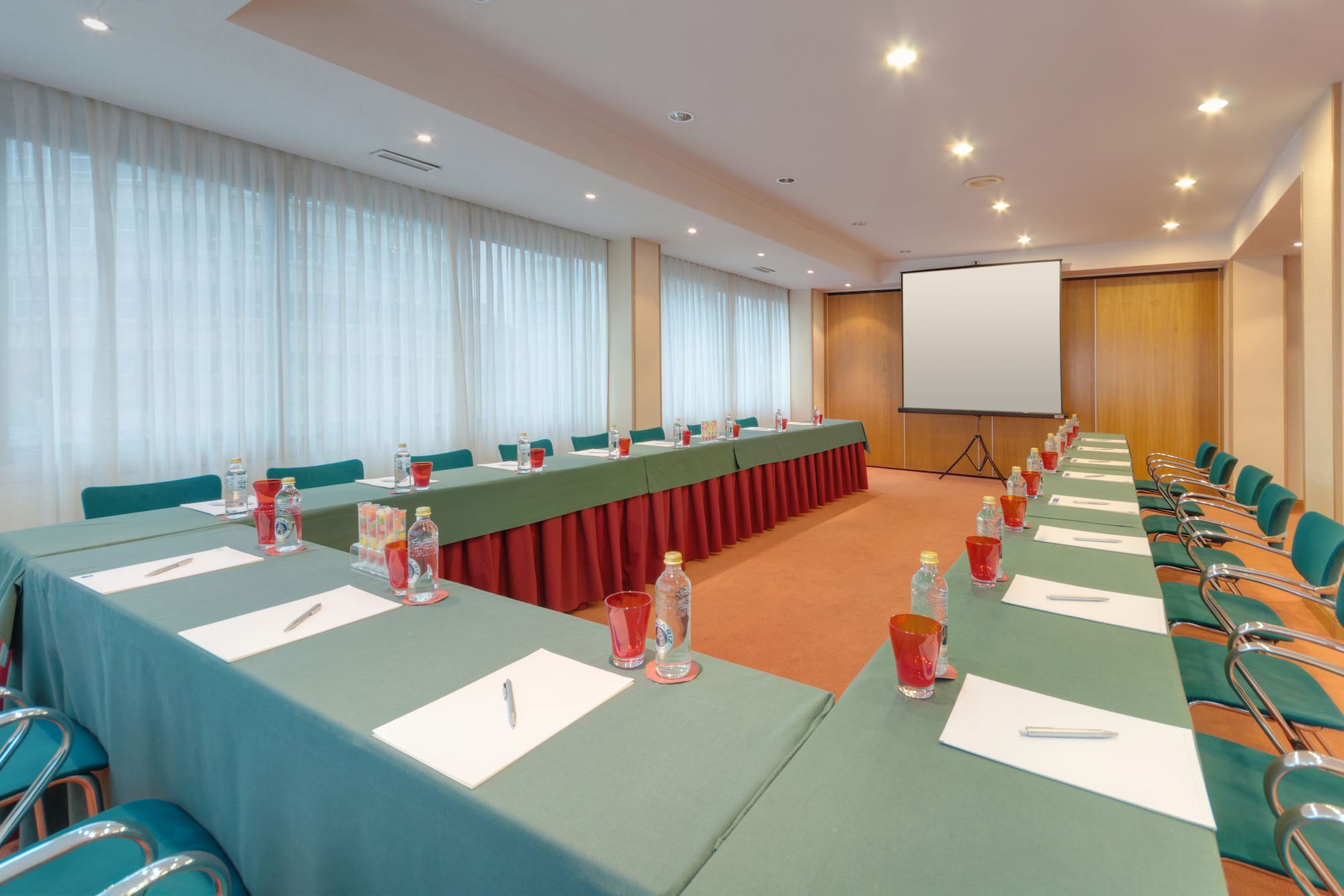 a room with tables and chairs