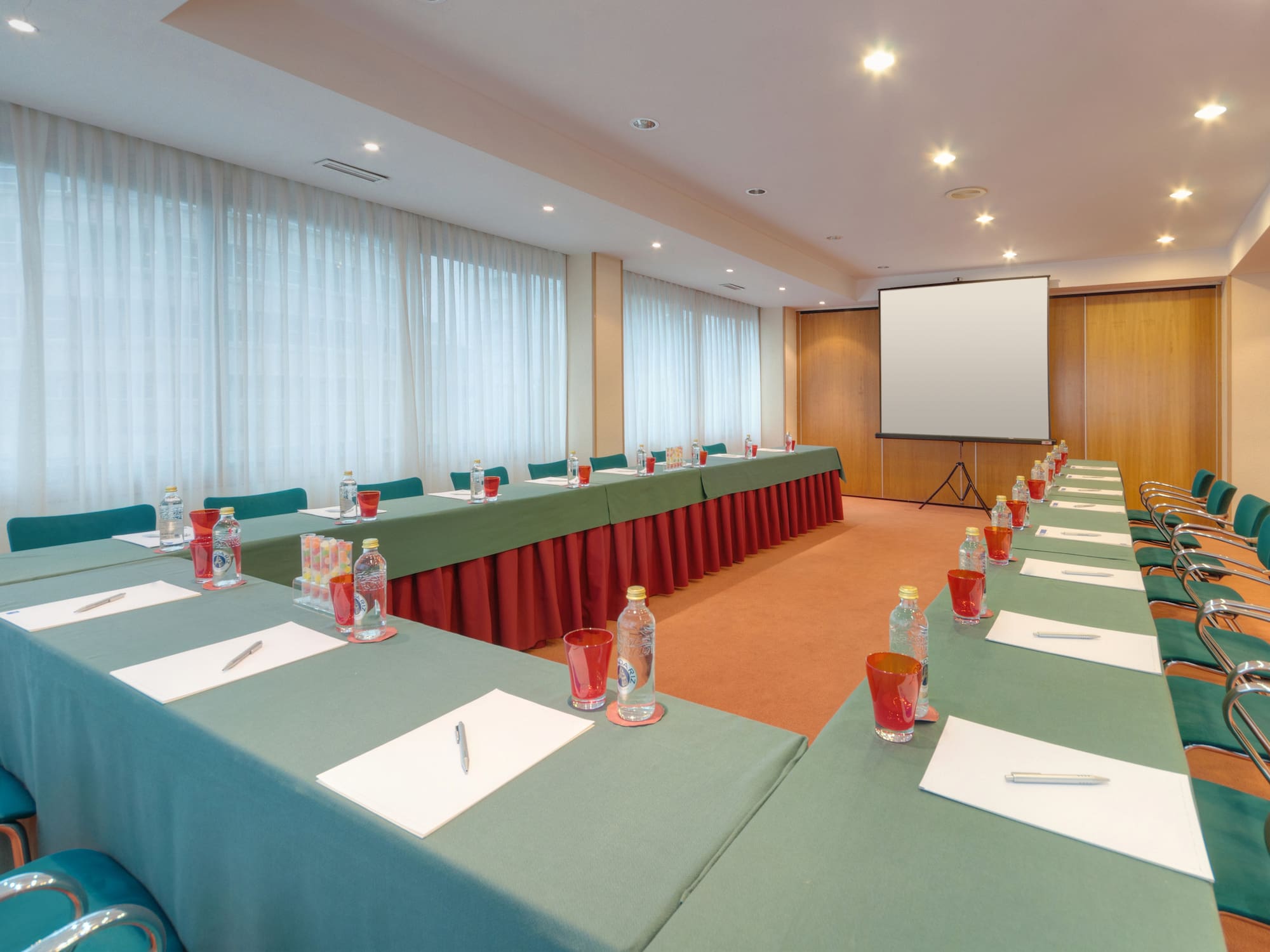 a room with tables and chairs