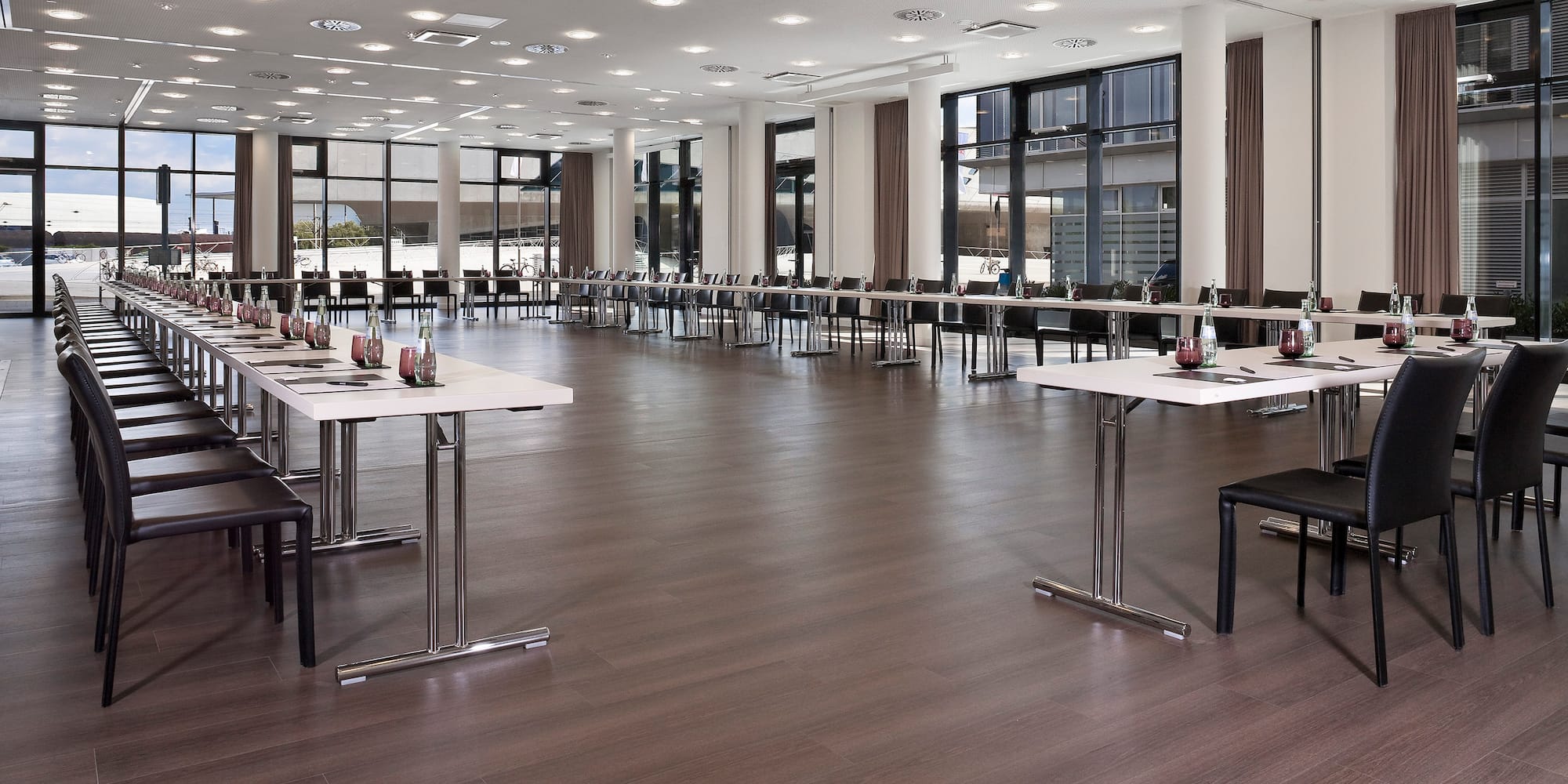 a large room with tables and chairs