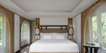 a room with a bed and a table