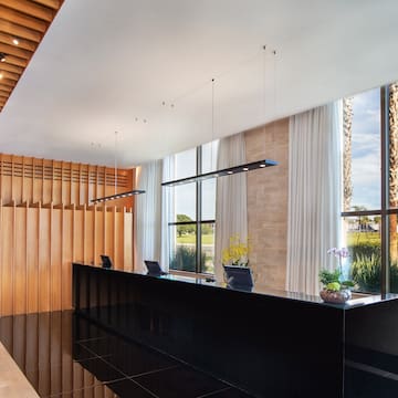 a reception desk in a hotel