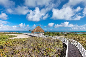 a walkway leading to a beach