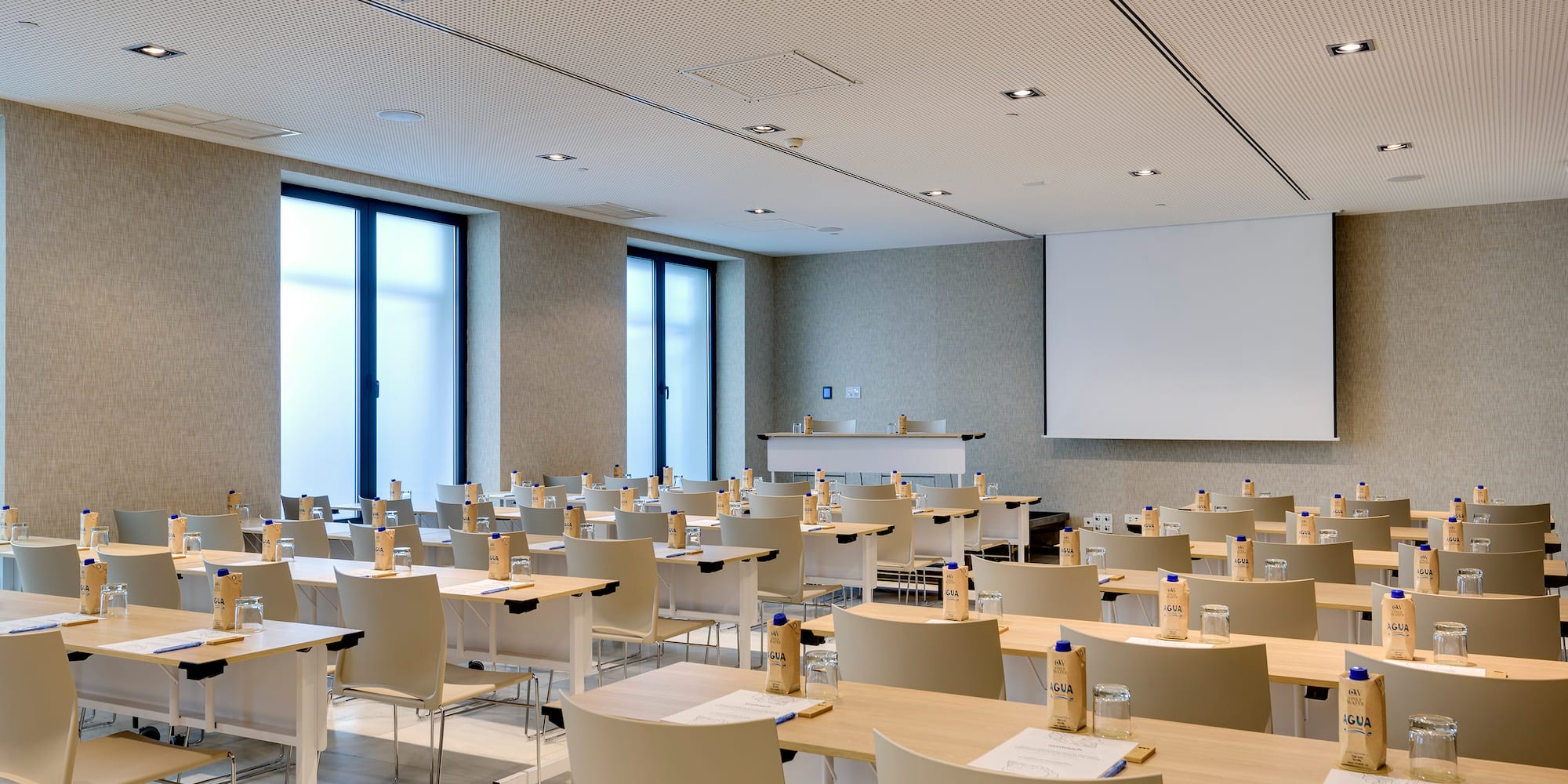 a room with tables and chairs