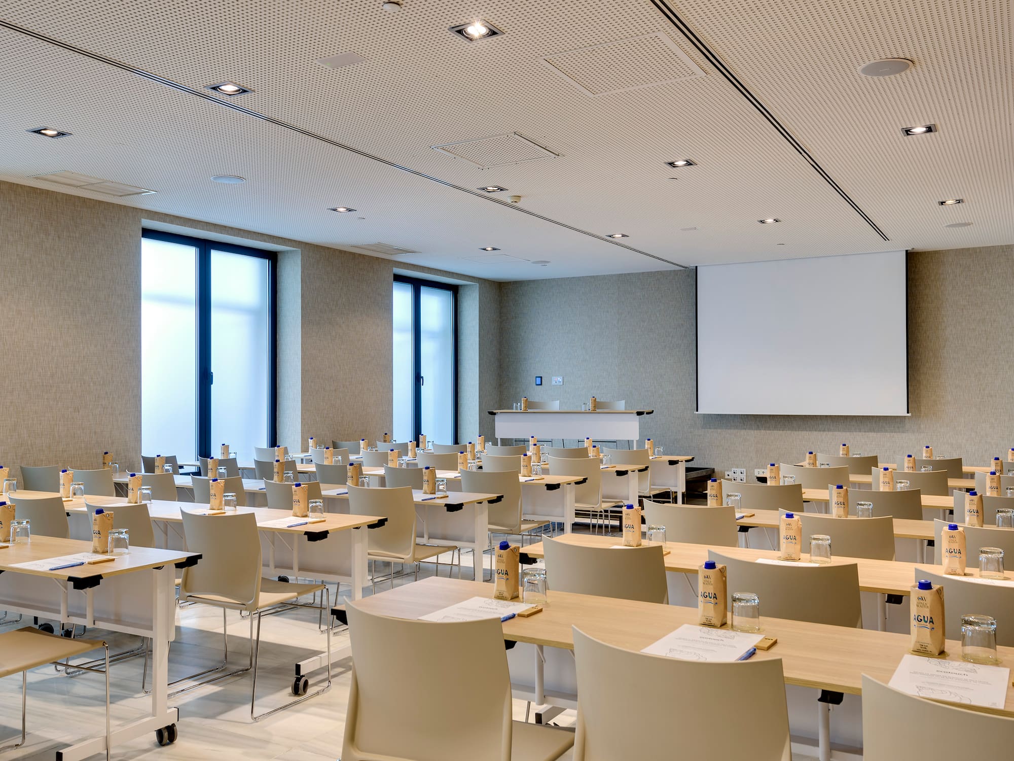a room with tables and chairs