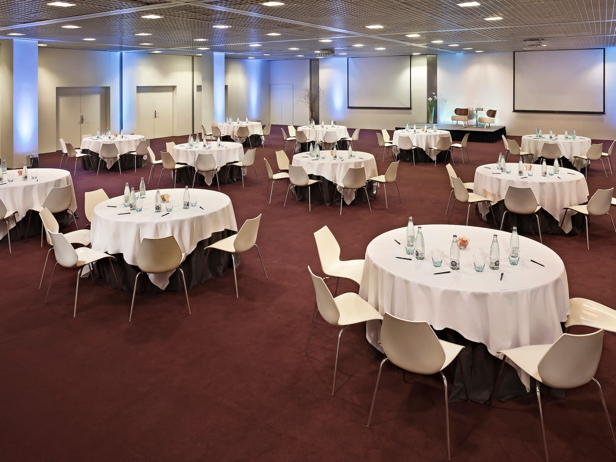 a room with tables and chairs