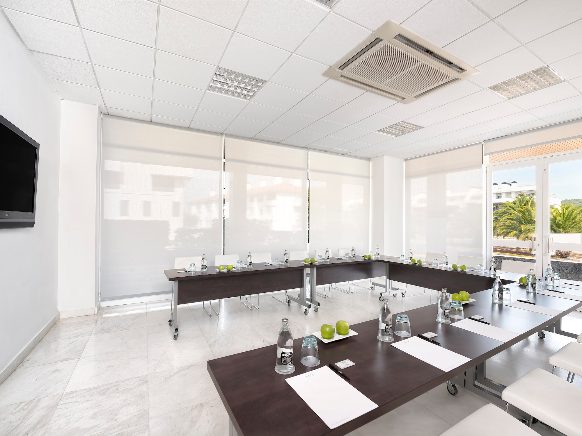 a room with tables and chairs