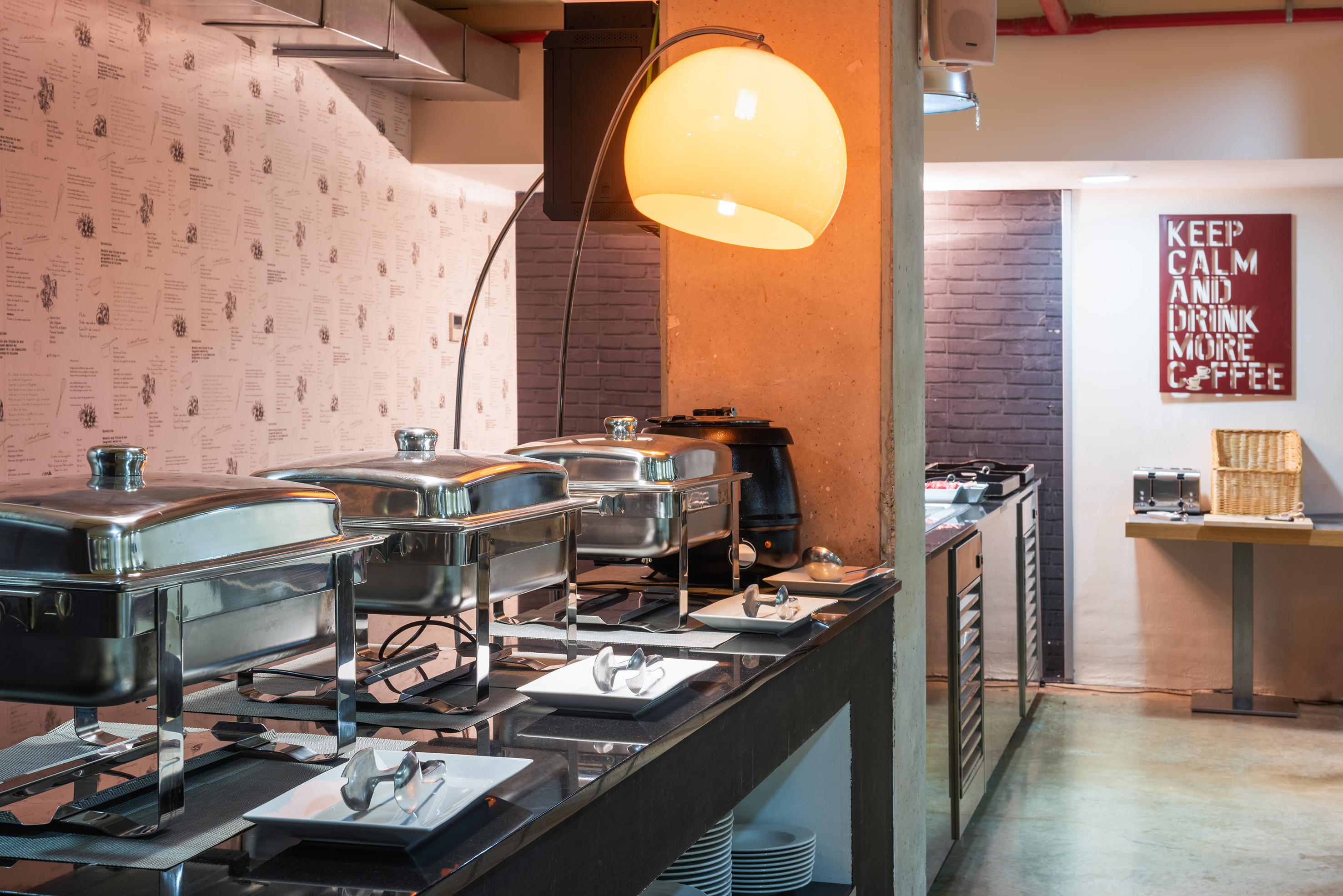 a buffet line with food on the counter