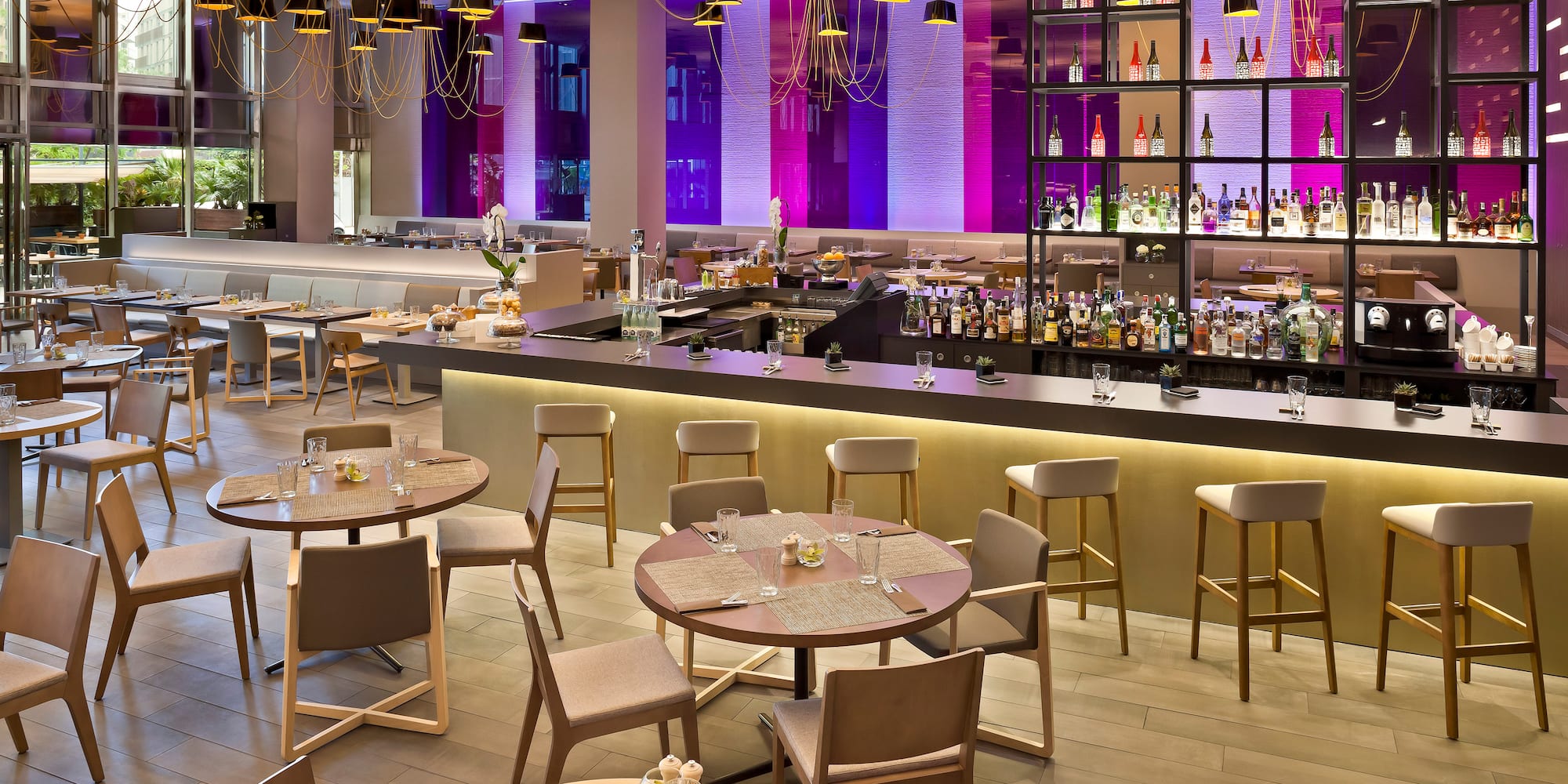 a restaurant with tables and chairs