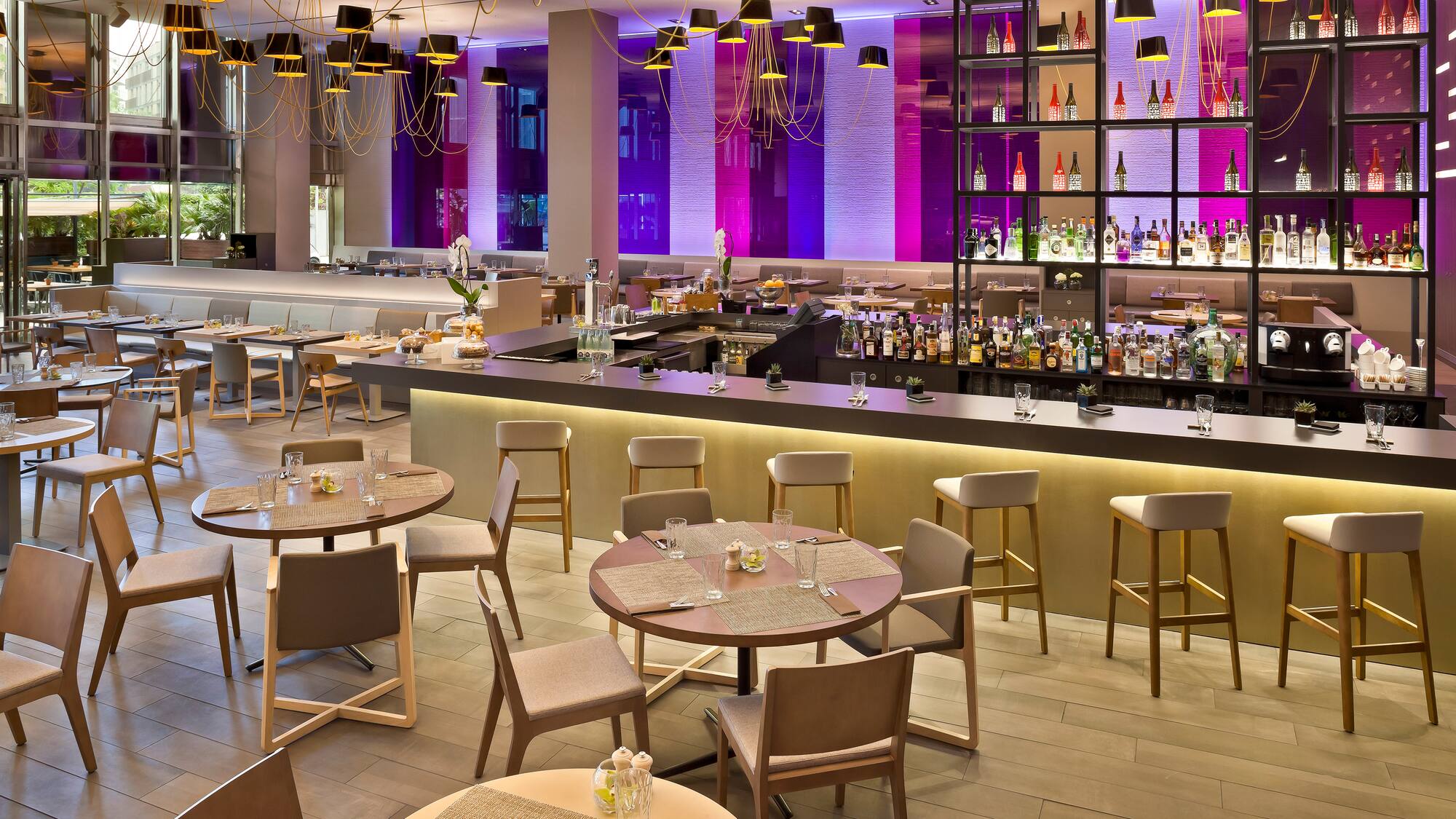 a restaurant with tables and chairs