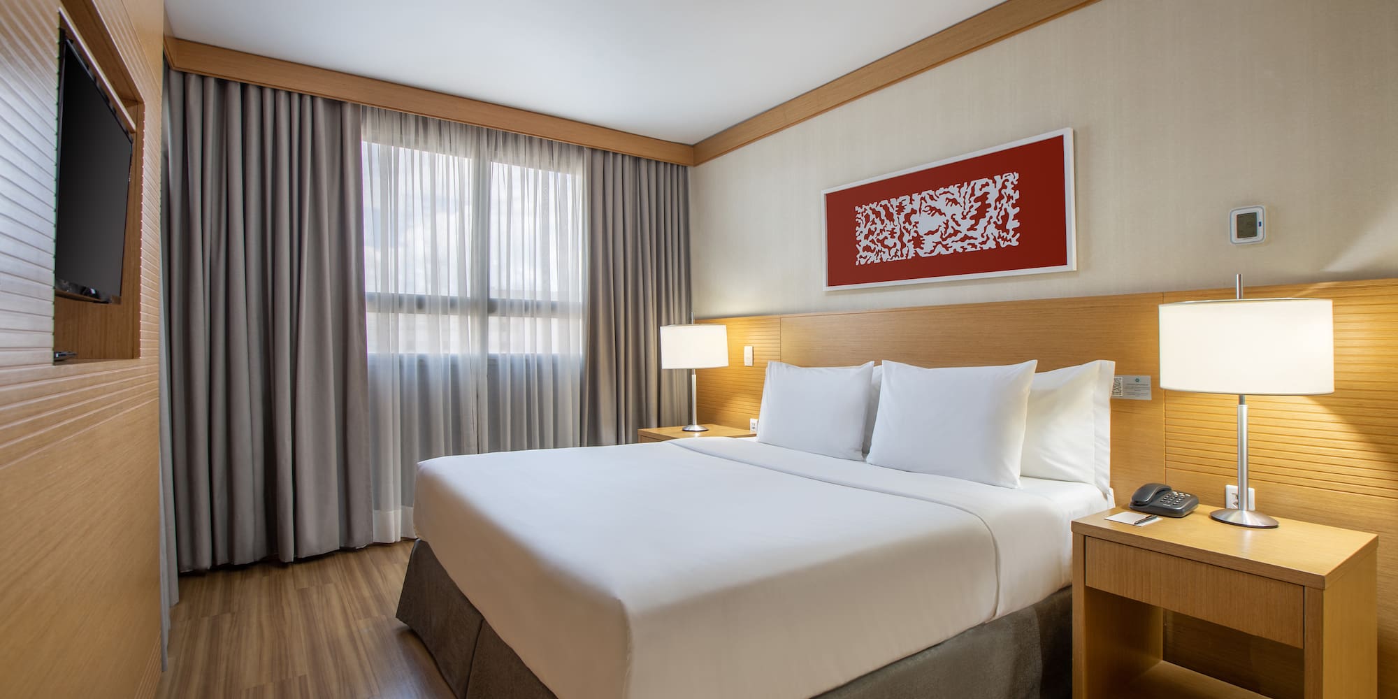 a room with a bed and a table