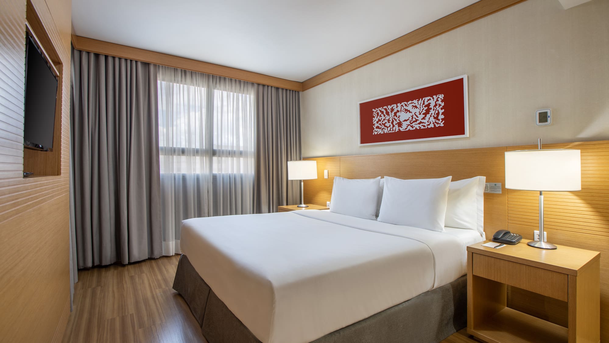 a room with a bed and a table