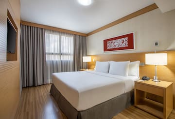 a room with a bed and a table