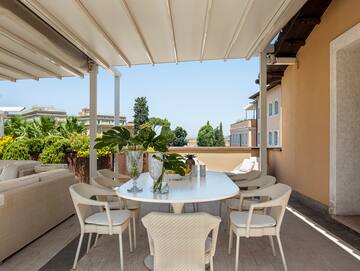 a table and chairs on a patio