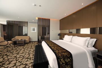 a bed in a hotel room