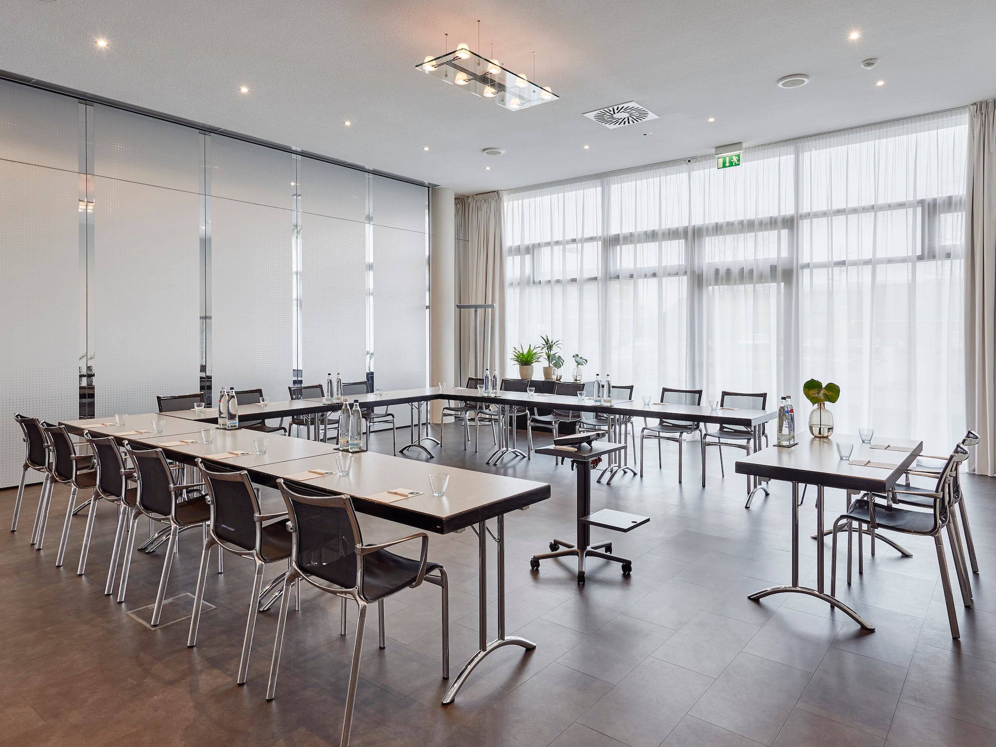 a room with tables and chairs