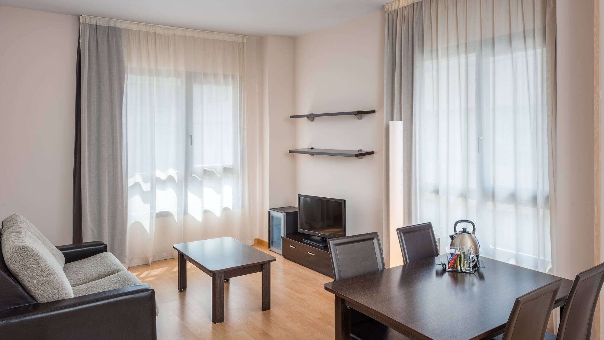 a living room with a couch and table