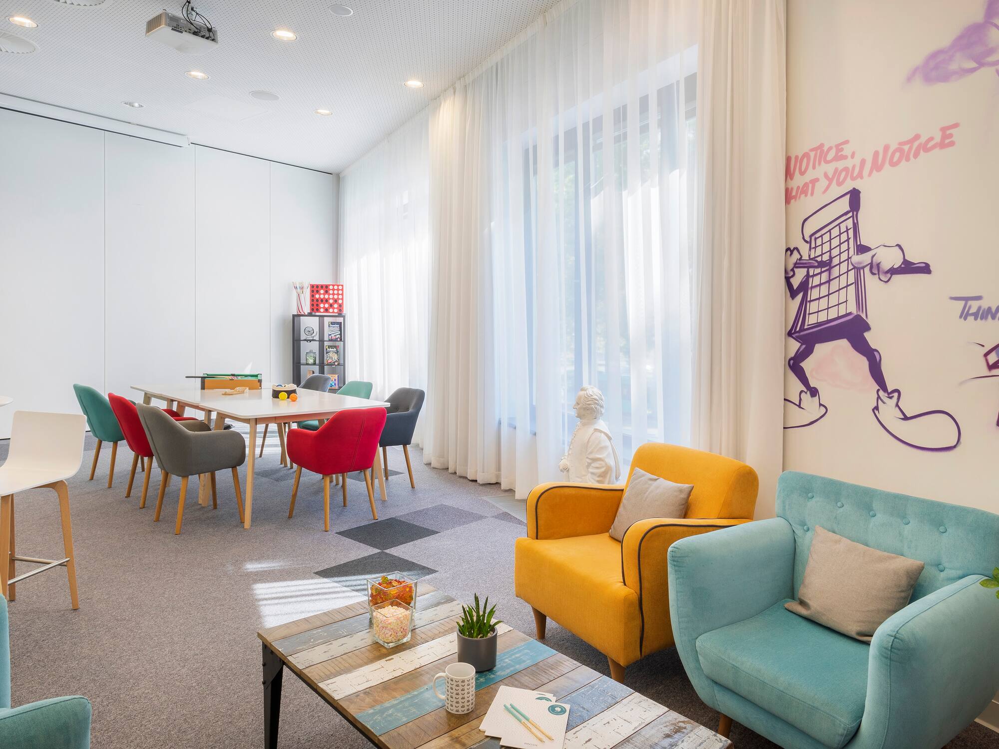 a room with a table and chairs