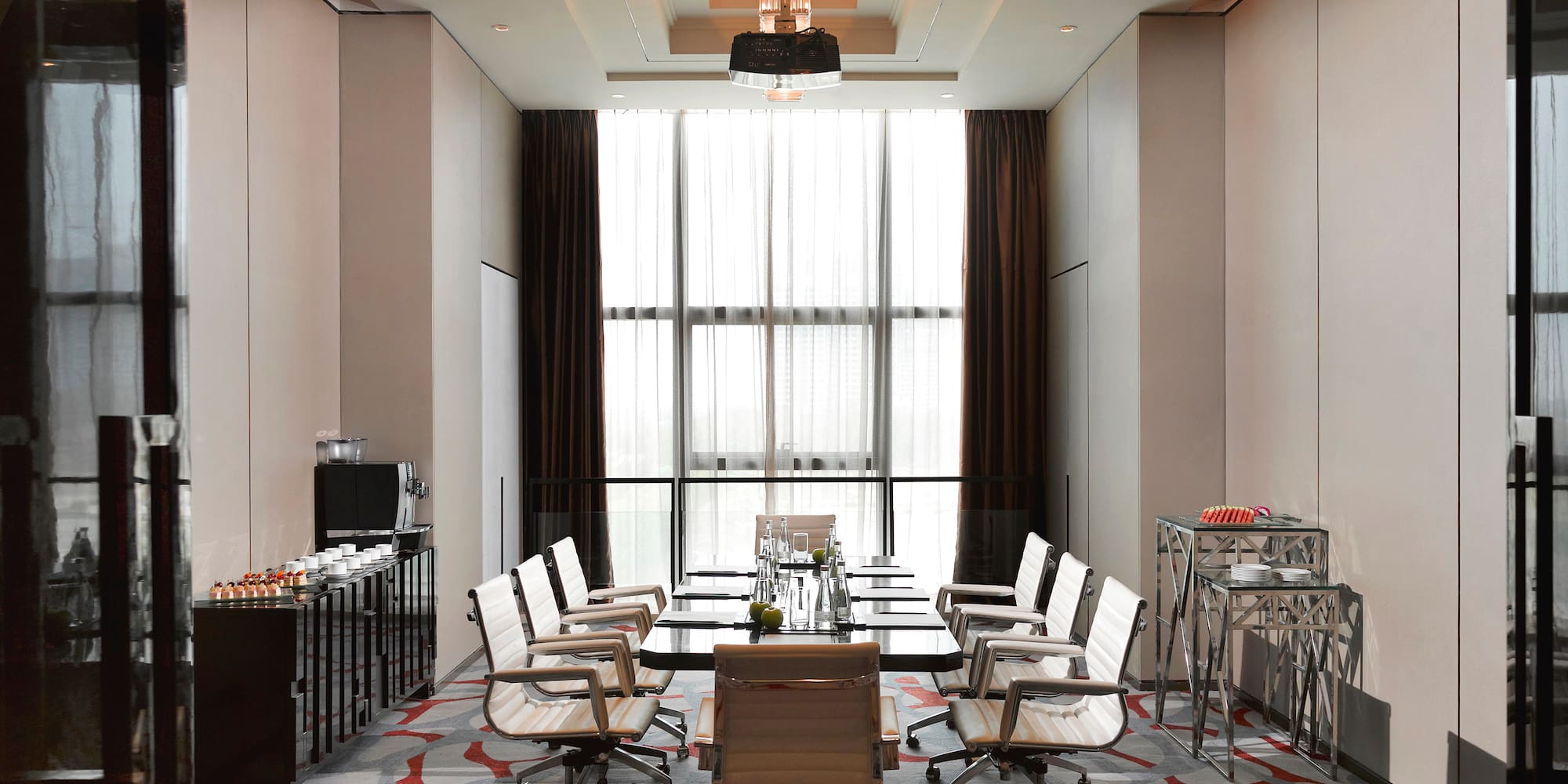 a room with a table and chairs