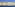 a row of colorful buildings on a body of water