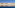 a row of colorful buildings on a body of water