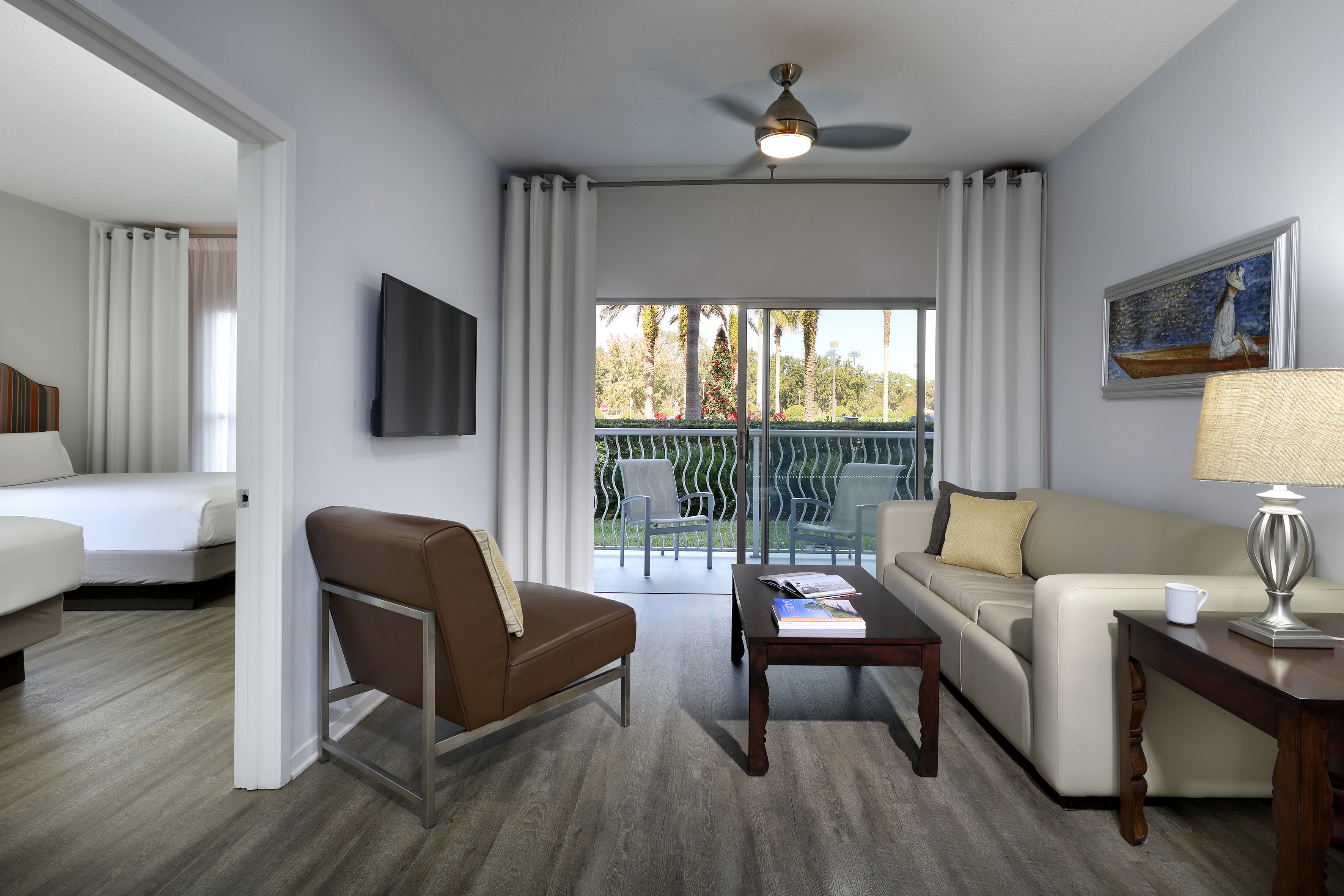 a living room with a television and couches