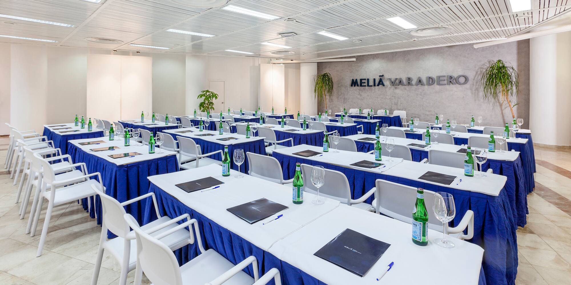 a room with tables and chairs