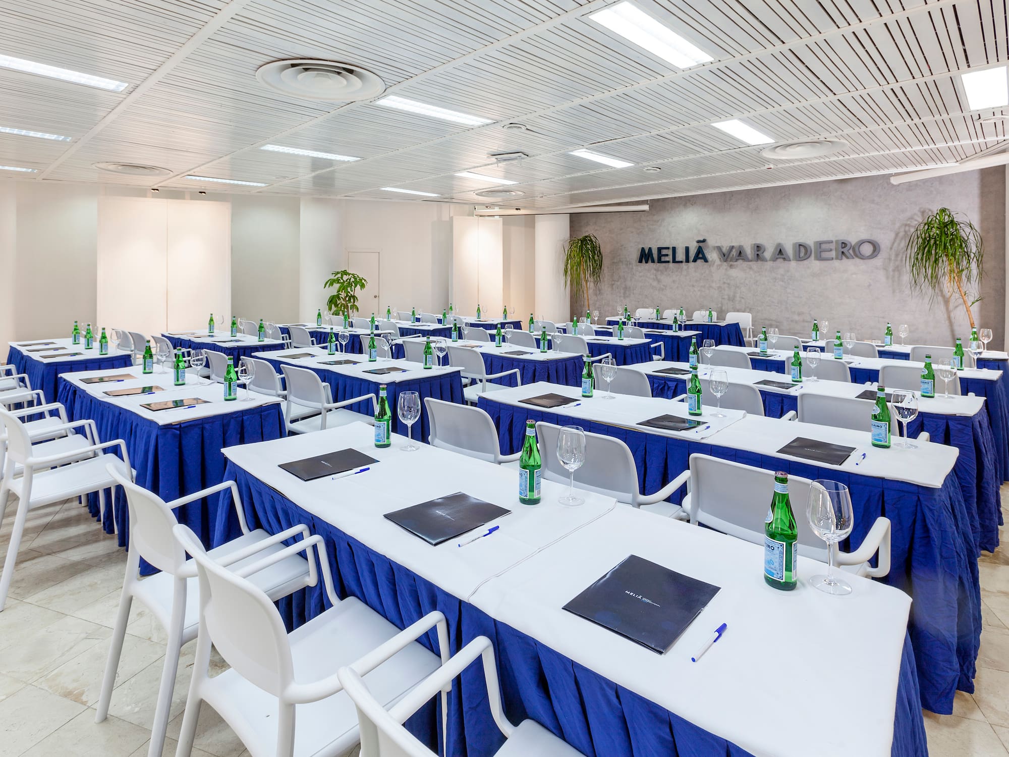 a room with tables and chairs