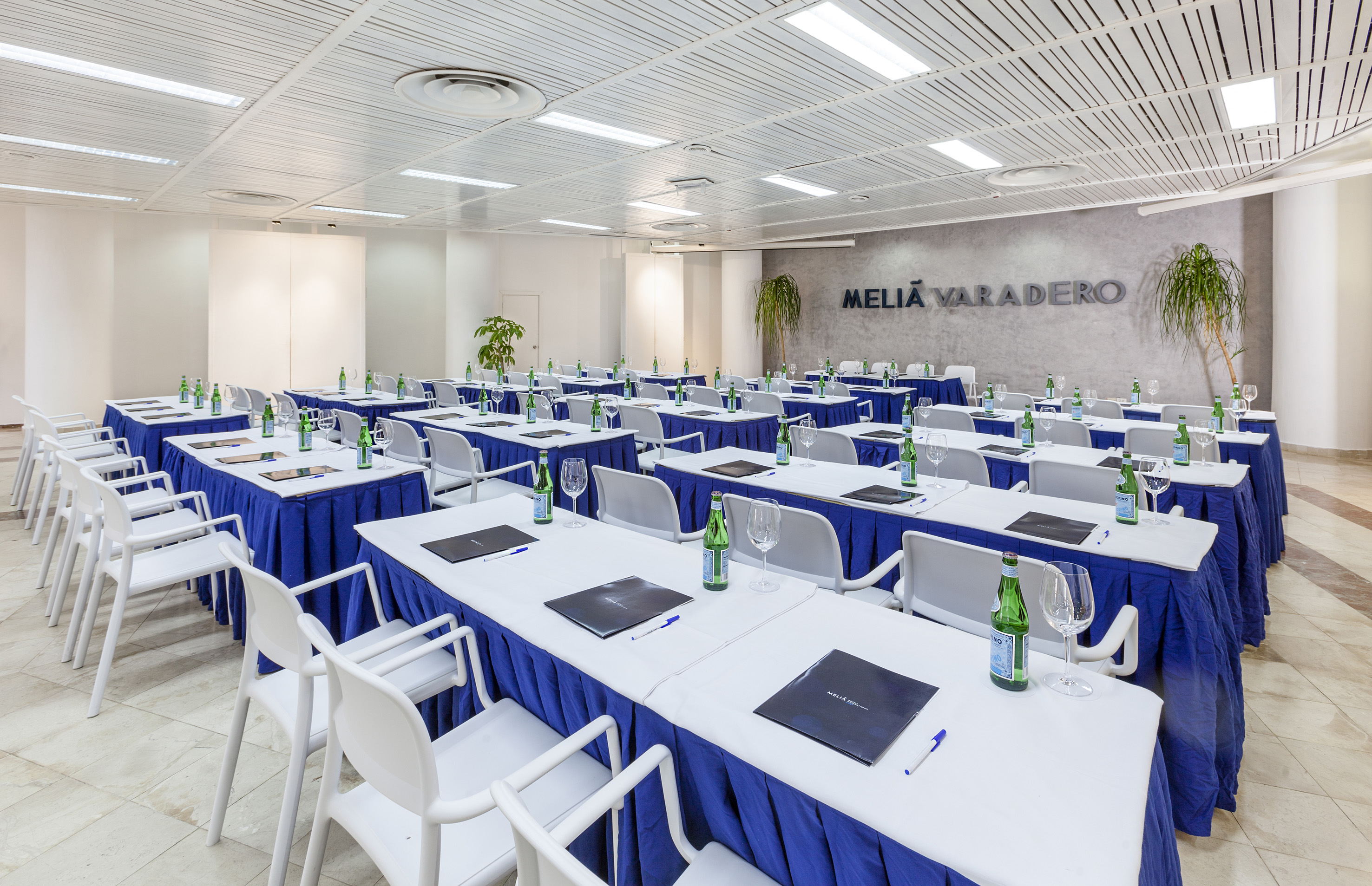 a room with tables and chairs