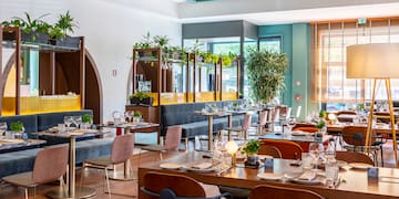 a room with tables and chairs