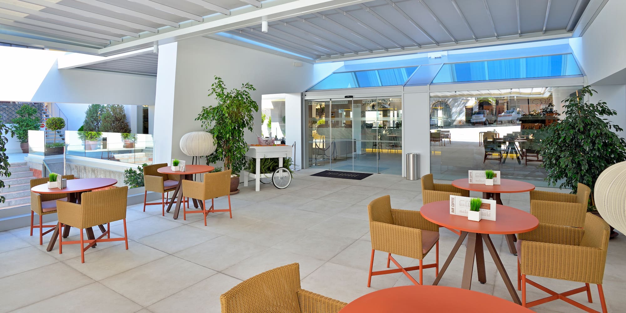 a room with tables and chairs