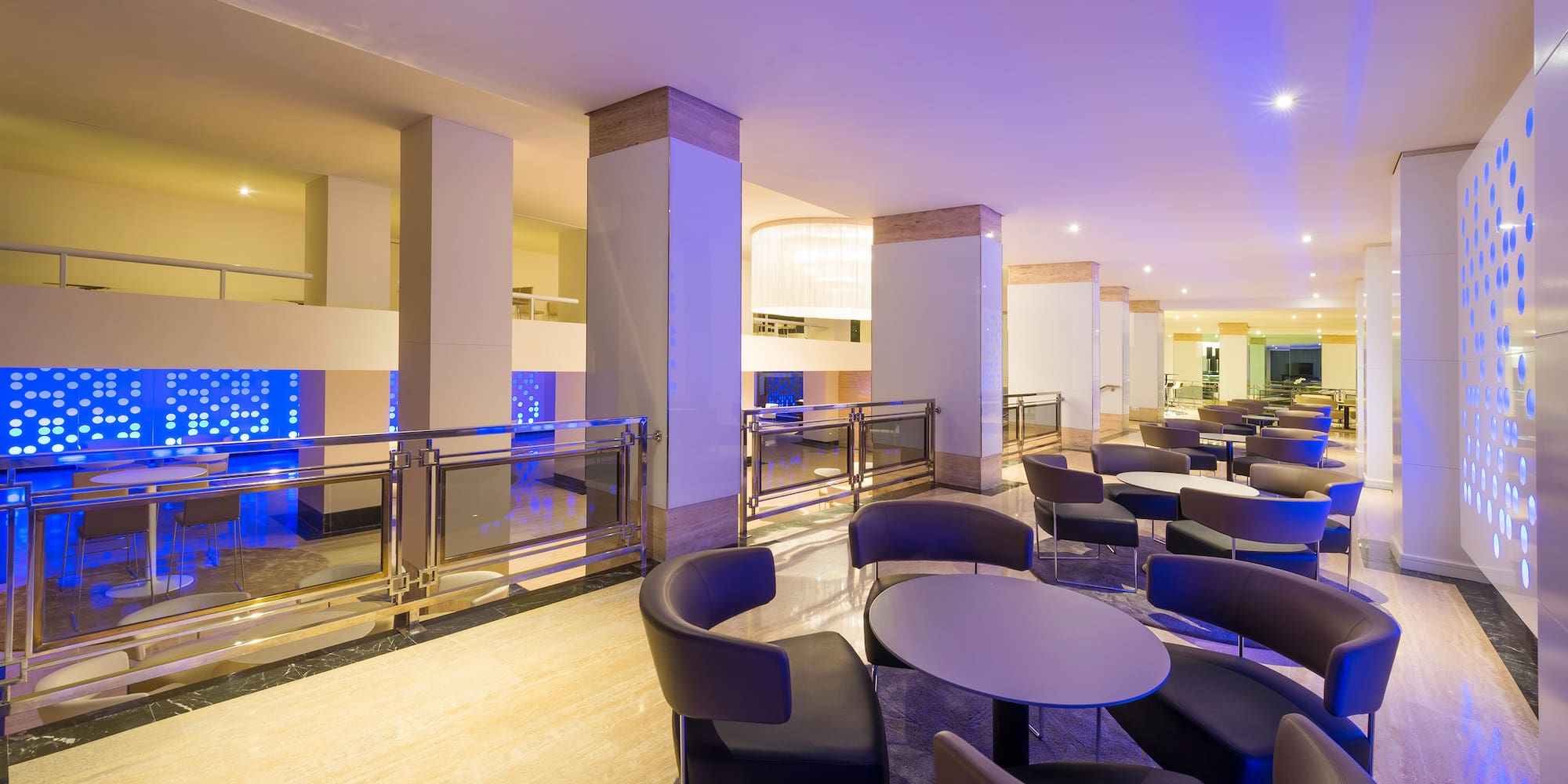 a room with chairs and tables