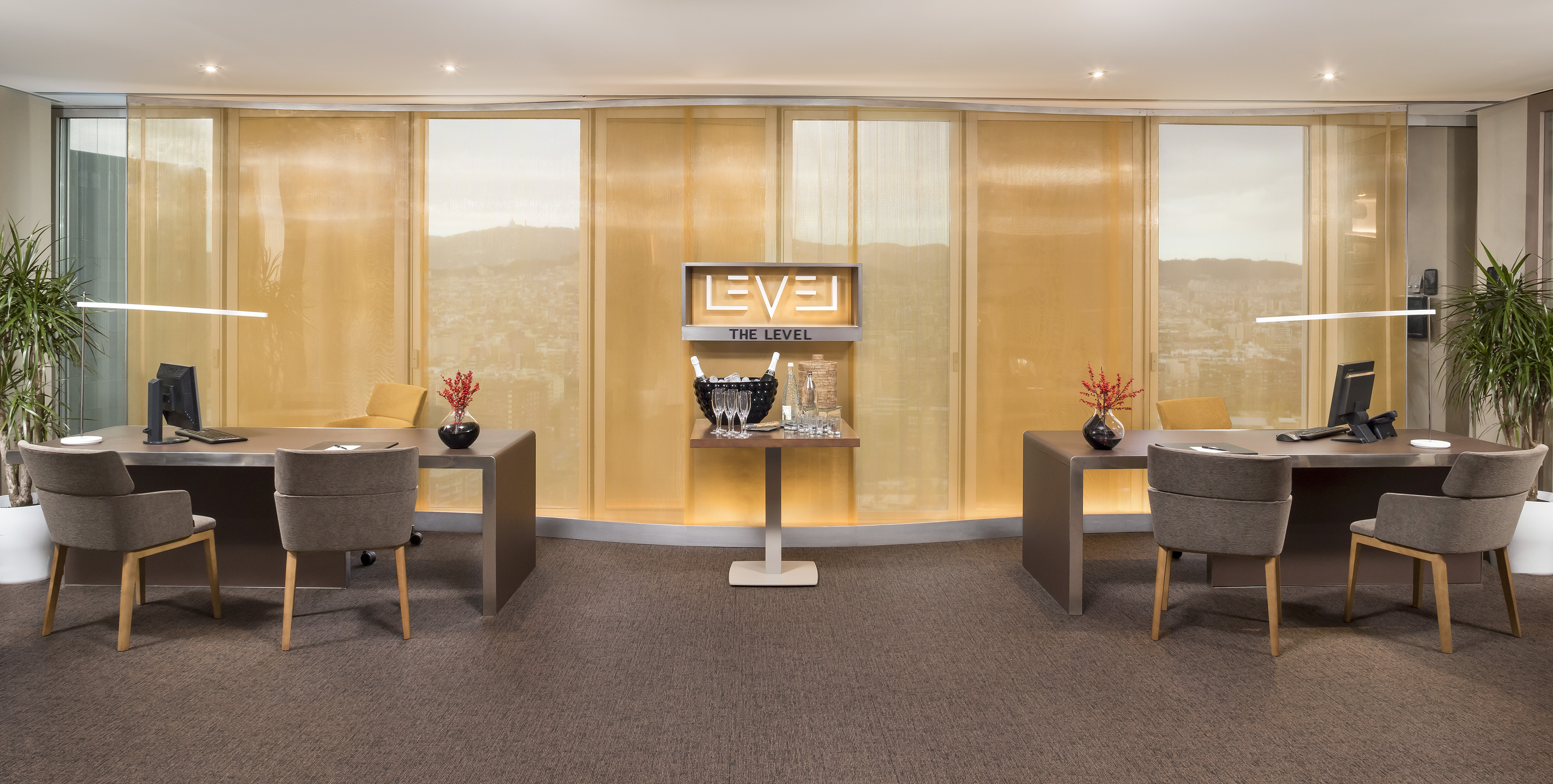 "The Level" luxury reception desks, champagne bar, and city view.