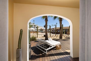 a bed on a deck