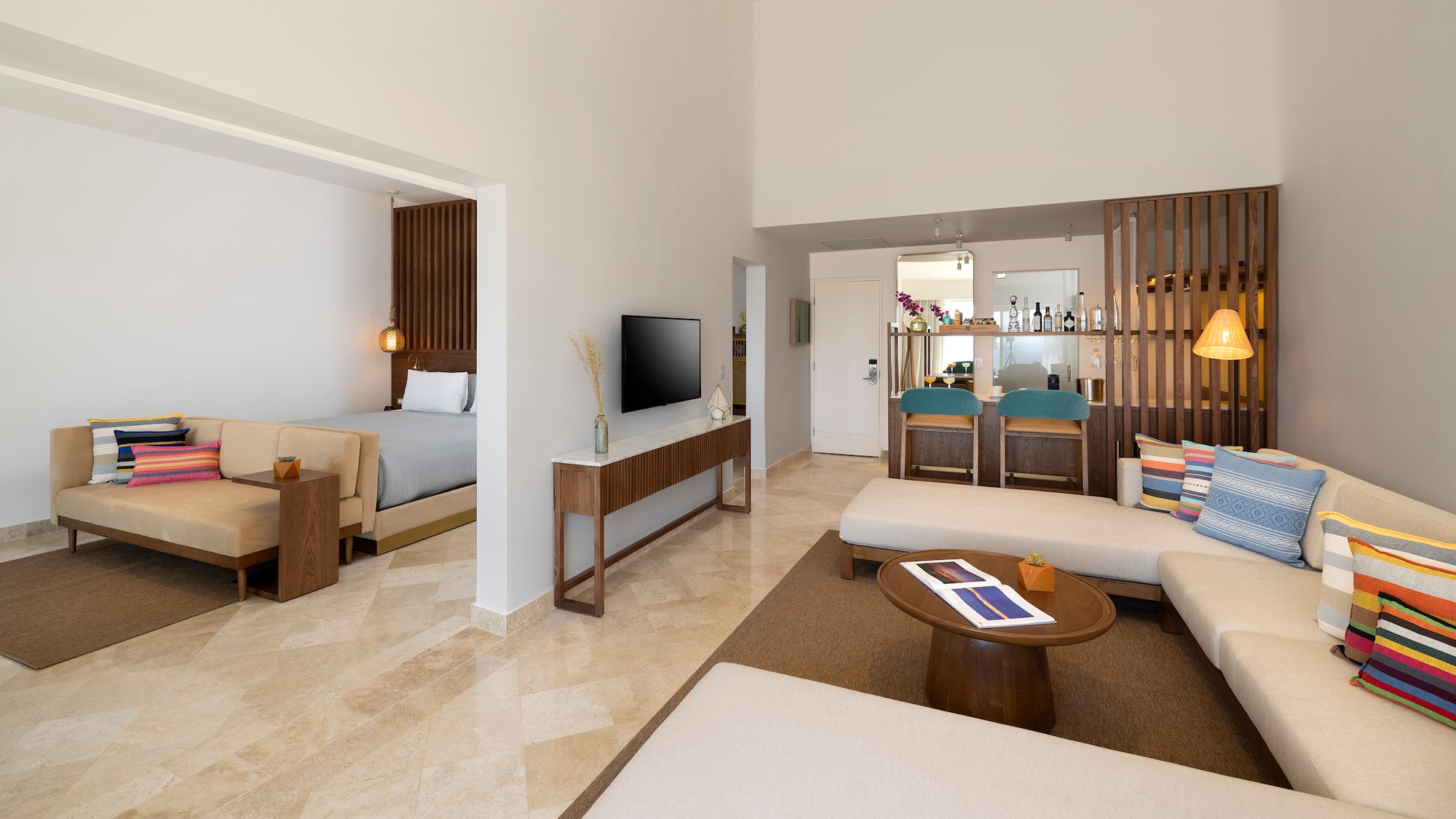 a room with a television and a bed