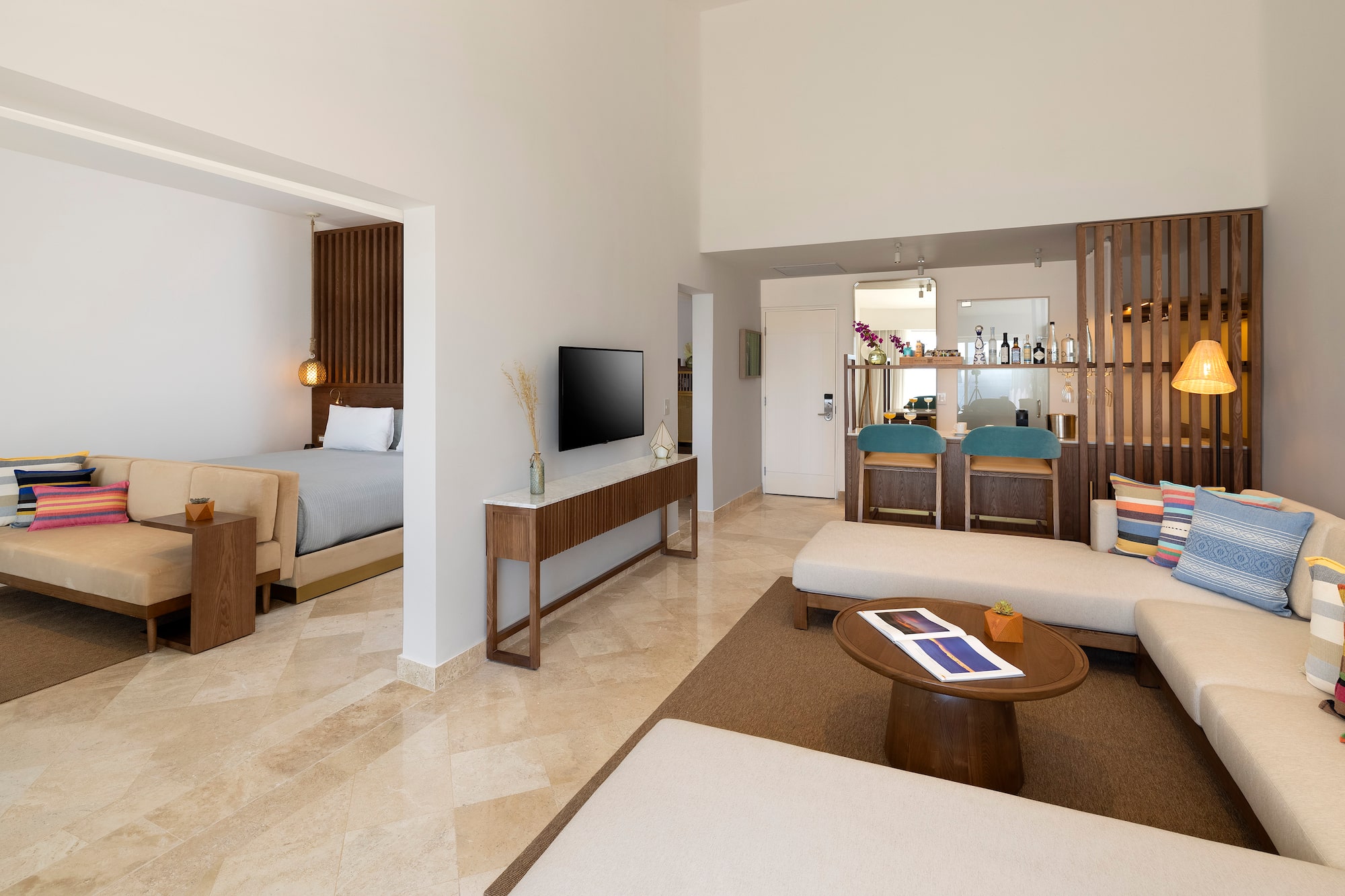 a room with a television and a bed