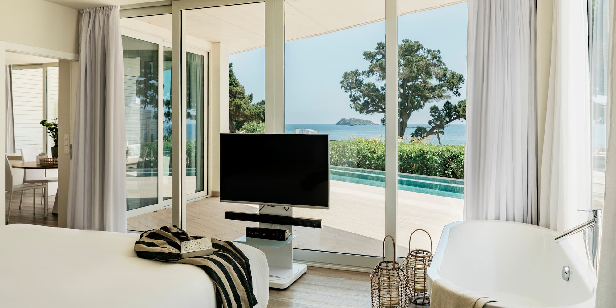 a room with a television and a tub