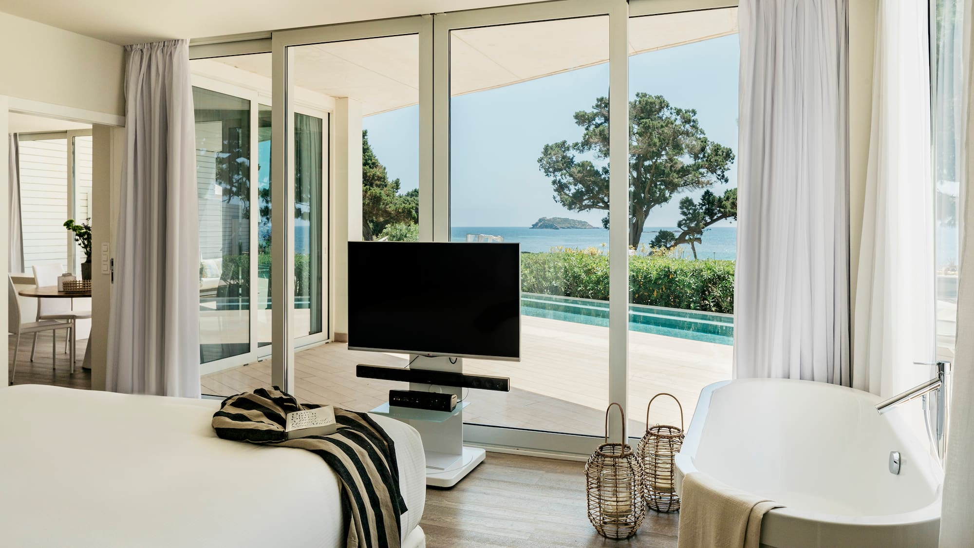 a room with a television and a tub