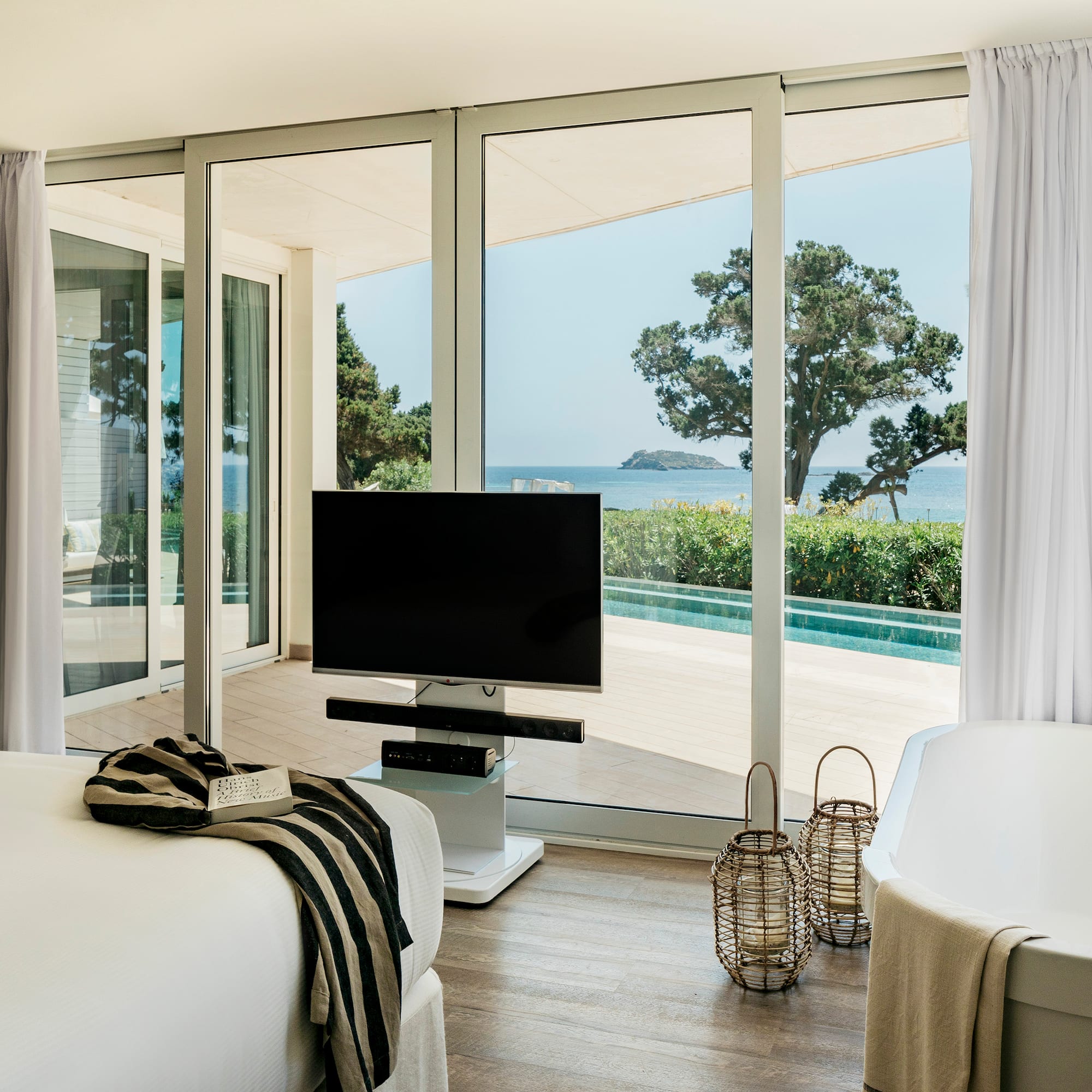 a room with a television and a tub