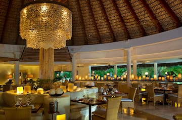 a restaurant with tables and chairs