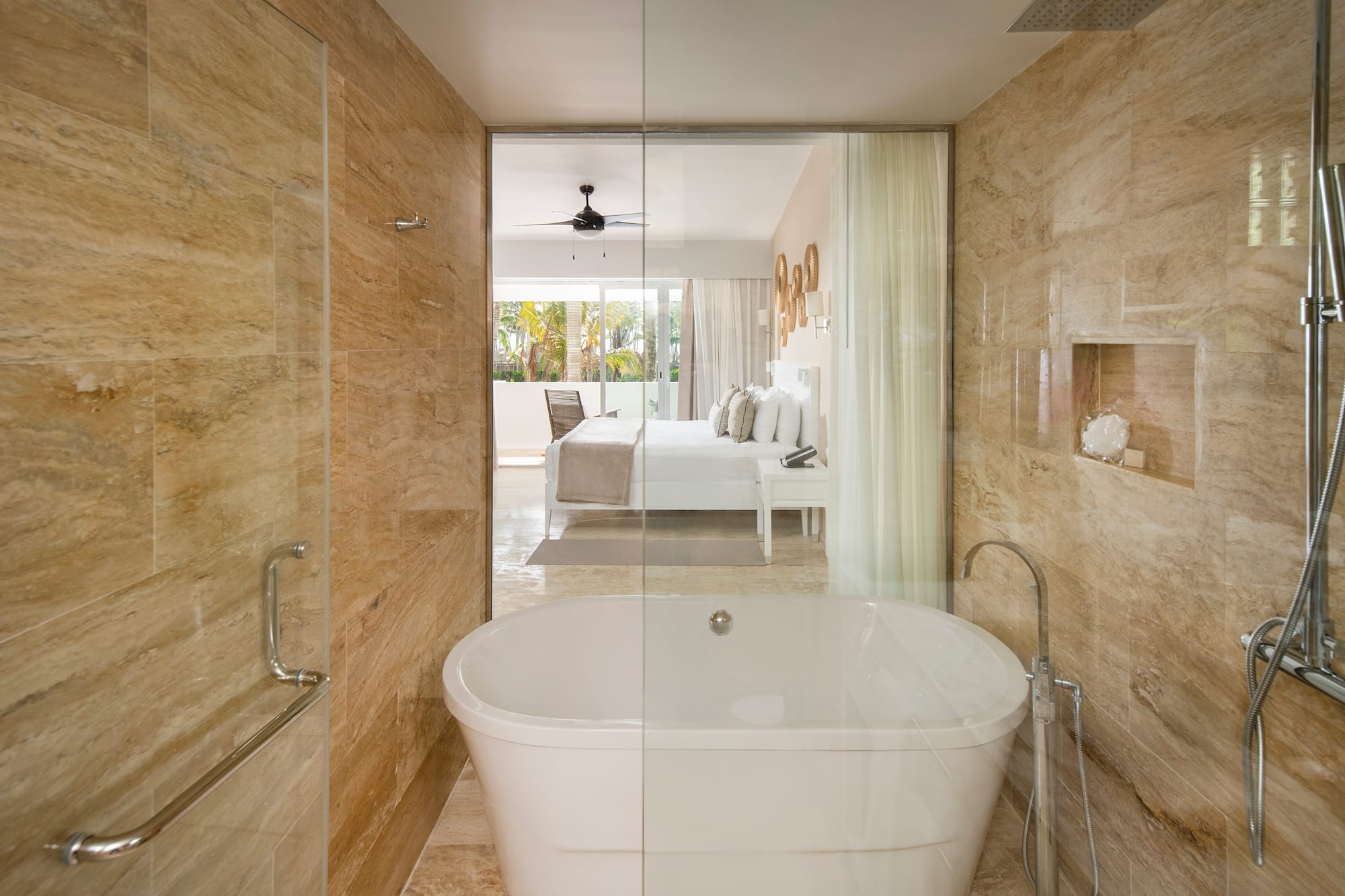 a bathroom with a tub and shower