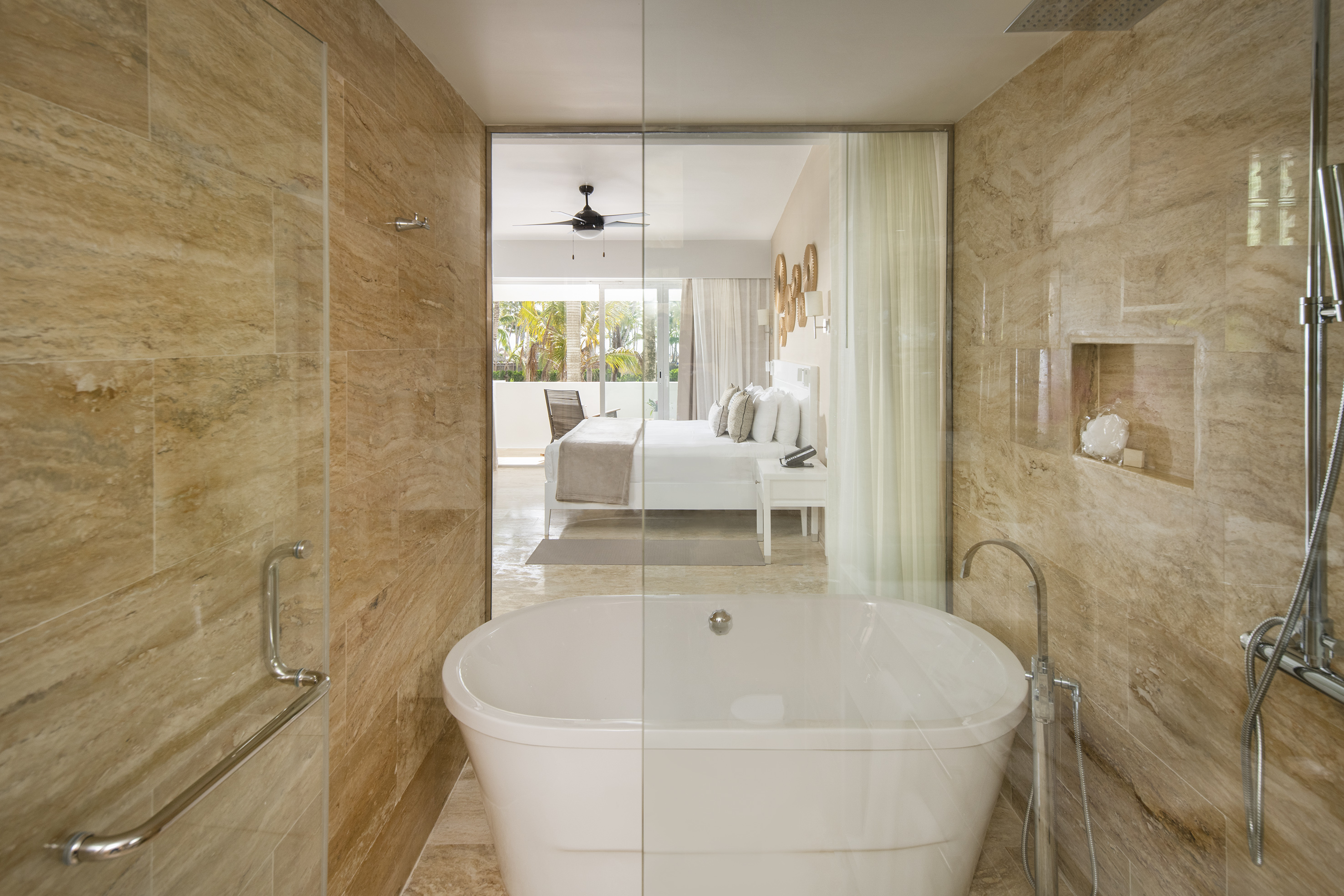 a bathroom with a tub and shower