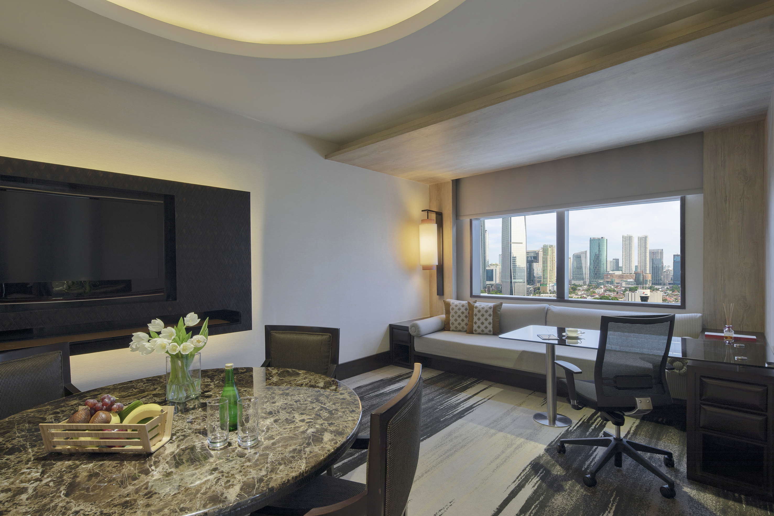 a room with a television and a table