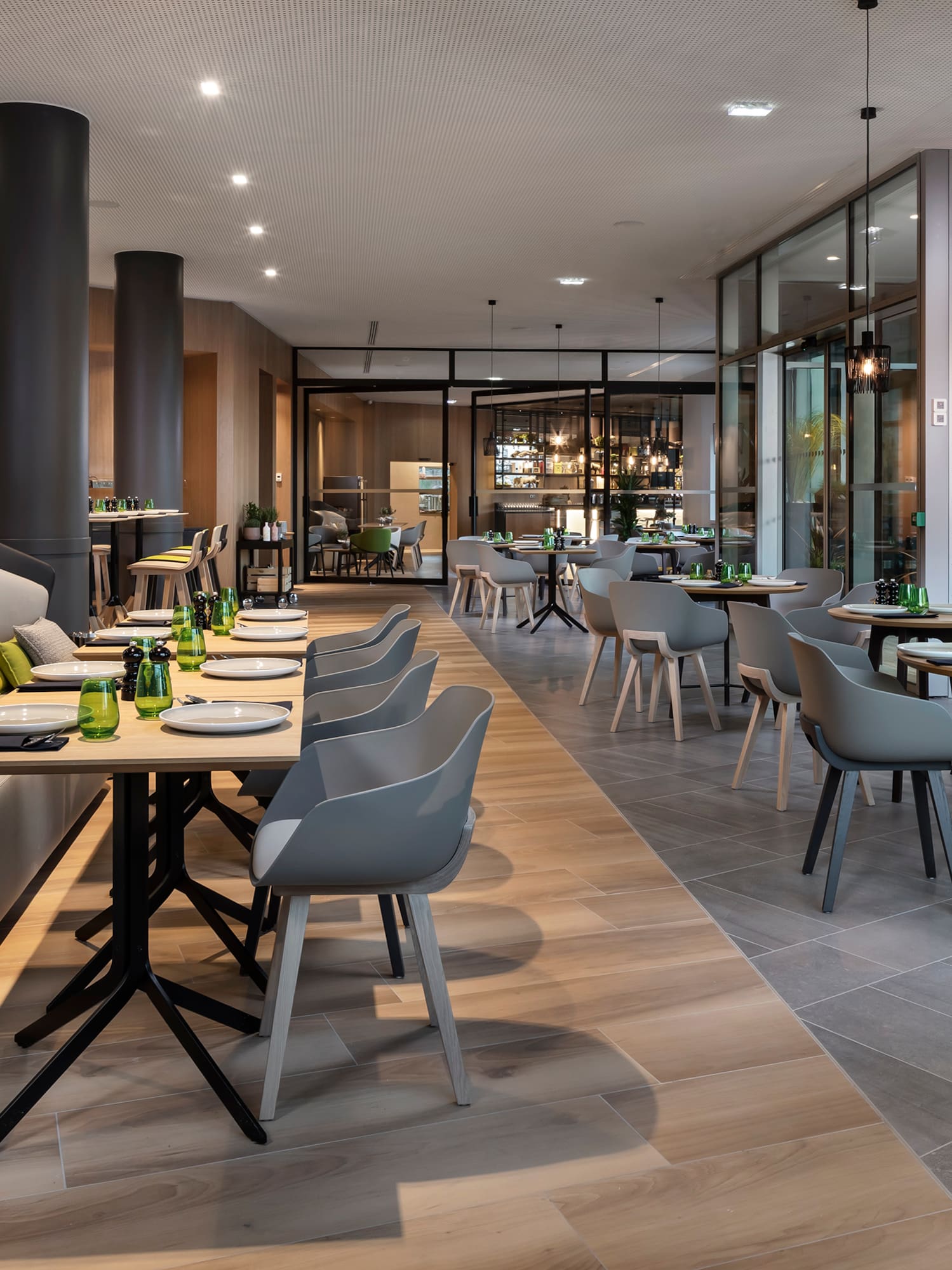 a restaurant with tables and chairs