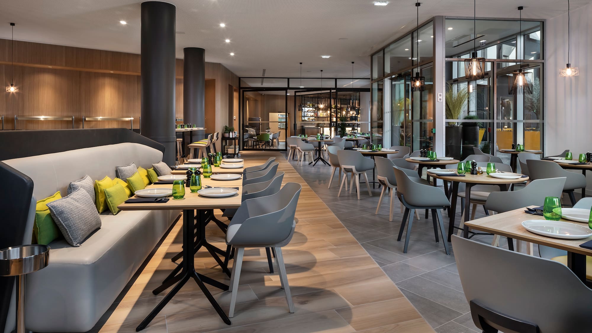 a restaurant with tables and chairs