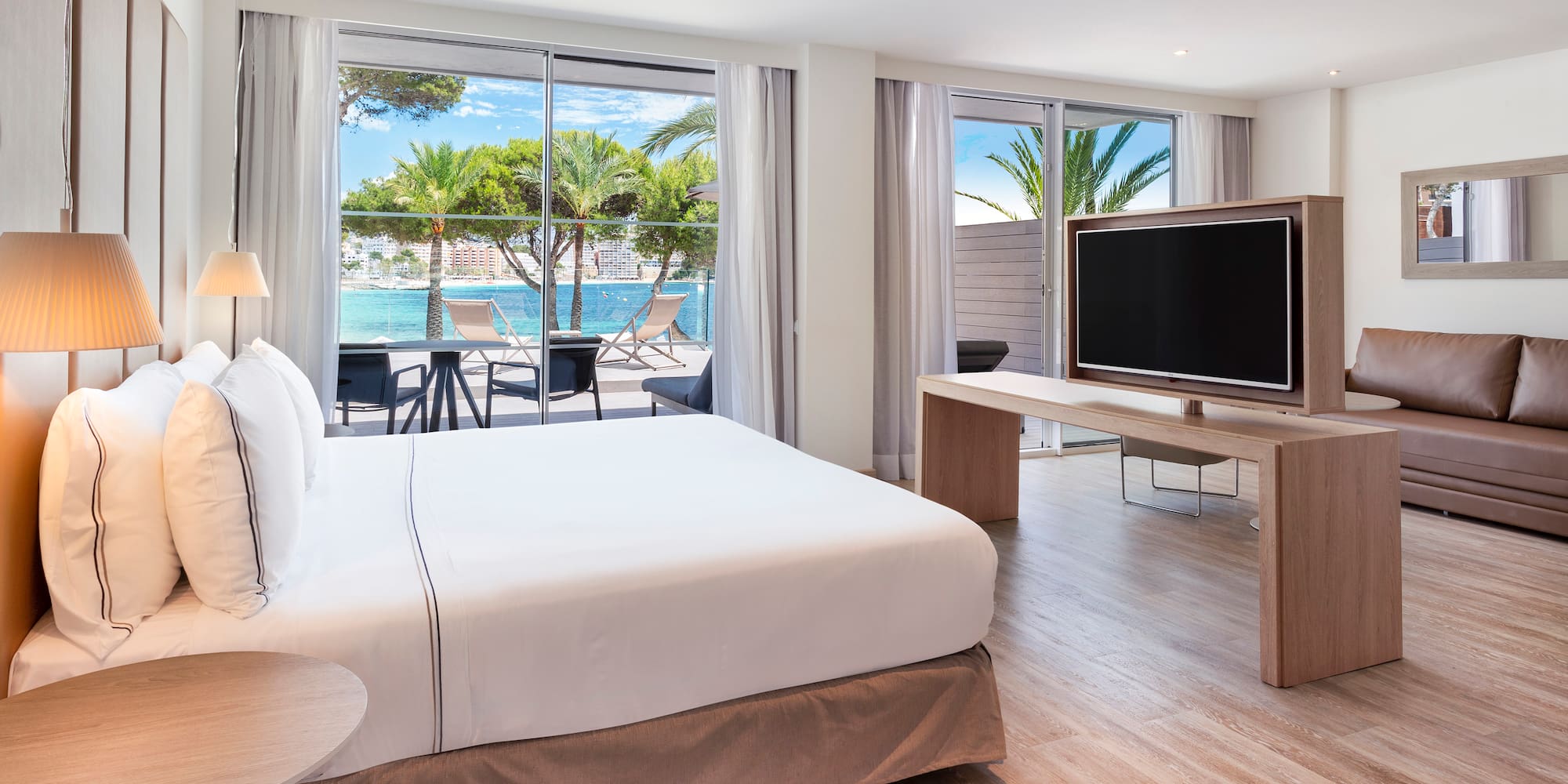 a room with a television and a bed