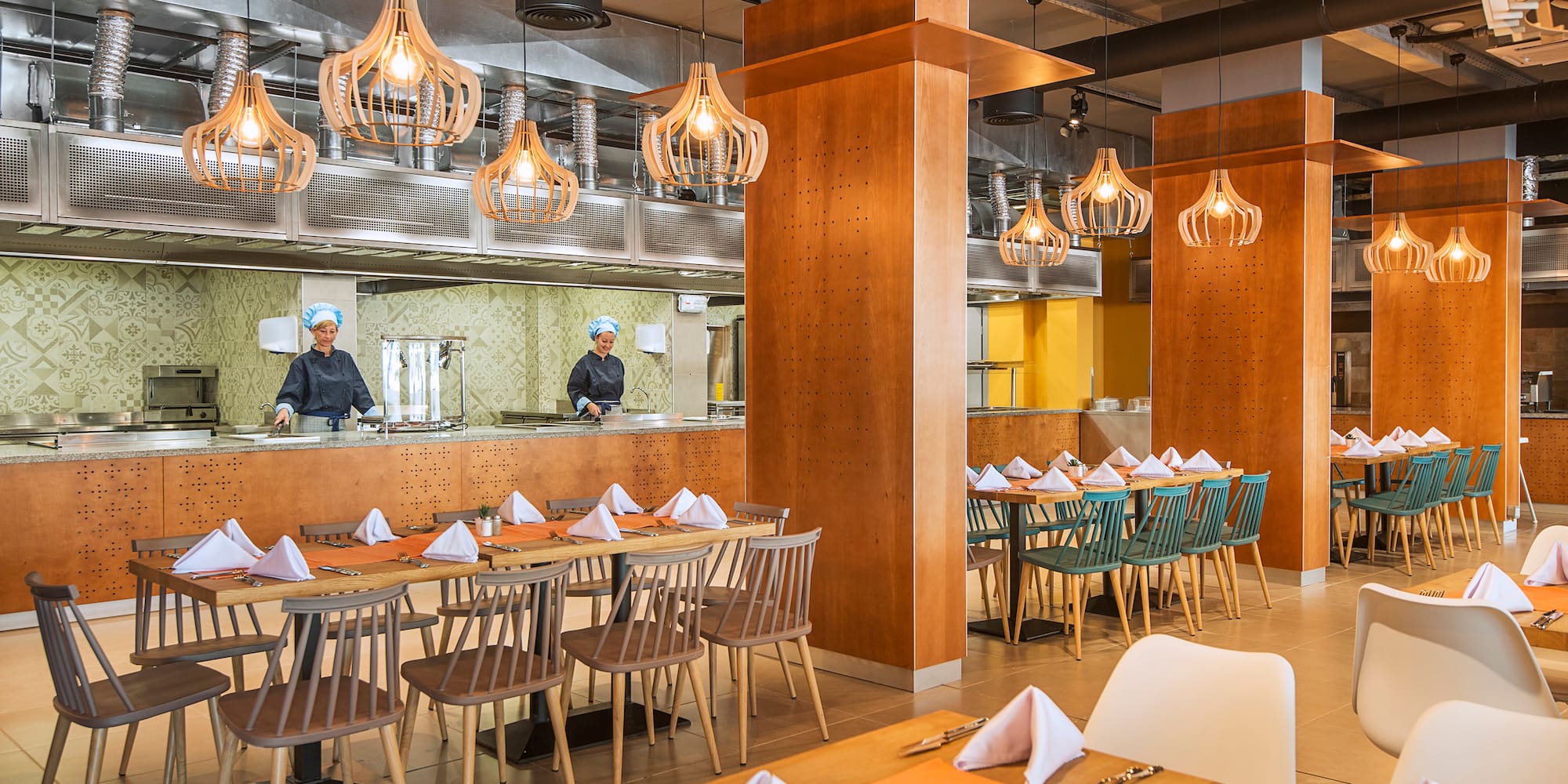 a restaurant with tables and chairs